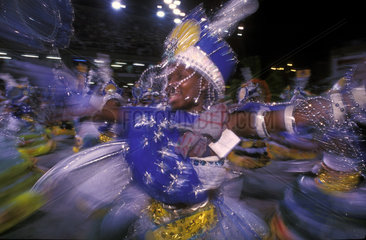 Baianas  Afro-descendant Carnival dancers  samba school parade  Rio de Janeiro  Brazil. Black woman  motion  vitality  joy  costumes.