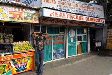 INDIA : New Delhi. Diagnostic cliniic on the Yusuf Serai Market  South Delhi. Note the print on the window pane which quotes the law about the disclosure of the gender of the unborn child.