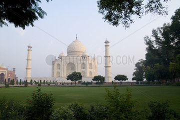 The quiet peaceful Taj Mahal at sunrise one of the wonders of the world in Agra India