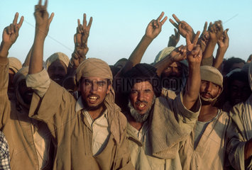 WESTERN SAHARA : Polisario supporters at a political rally in the desert.