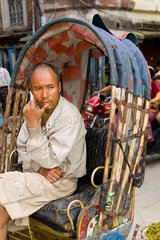 Portrait rickshaw driver Hindu in Jaipur Rajasthan India