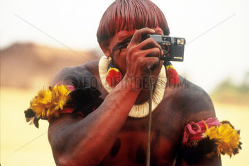 Xingu  Amazon  Brazil. Yaulapiti indigenous People. Native with camera.