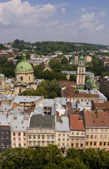 Aerial from above shot from City Hall tower of the beautiful city of Lviv Ukraine looking at city buildings at the old buildings of city center