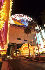 Gambling at the Fremont Street area in the desert exciting Las Vegas Nevada at night with all the neon lights and energy in the USA
