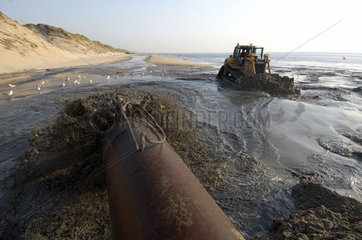 The dutch North sea beach is suppleted with sand pomped from the sea bottom