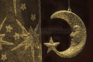 Decorations of Christmas in the star and gilded moon shape