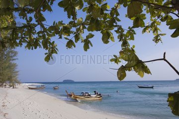 Beach boat and sea at Ko Tarutao Maritim NP Thailand