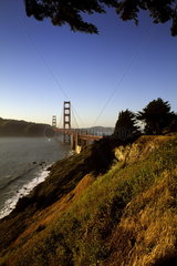 Famous Landmark of San Francisco the Golden Gate Bridge from unusual angle looking north across bay into Marin County