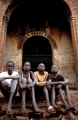 Sudan  Torit. Orphans who have lost their parents during civil war  in front of a catholic school.