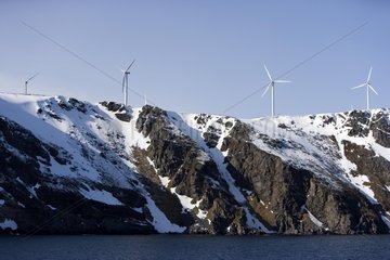 Windmills on a snow-covered mountain North Norway