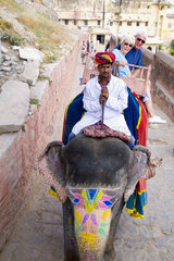 Colorful elephant rides at Amber Fort in Rajasthan Jaipur India