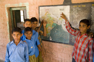 School portrait in elementary school near Jodhpur in town of Rinawey Upper Primary School India showing where India is on map students ages 10 thru 12 in Rajasthan India