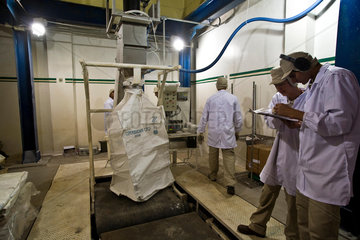 Sugar production process. Loading bags with sugar for exportation. Brazil.