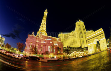 Gambling at the famous Paris Hotel in the desert exciting Las Vegas Nevada at night with all the neon lights and energy in the USA