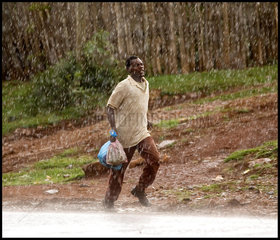 man running in the rain