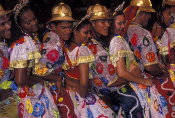 Bumba-meu-boi  popular party that mix religious elements and ancient fables. Cacuriá da Dona Teté - São Luis city  Maranhão State  Brazil. people wearing costumes and dancing  folklore  dance.