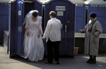 Moscow  a bride using the public toilets