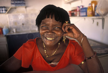 Portray of a black old smiling woman at Alcantara  Maranhão State  Brazil.
