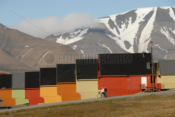 SVALBARD or SPITZBERGEN NORWAY. Summer landscape outside Longyerbyn the capital of these far flung islands 1000 kilometers from the North Pole. Here some colorful houses in Longyearbyn __Alexander Farnsworth