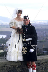 Traditional wedding couple on marriage wedding day in Glasgow Scotland