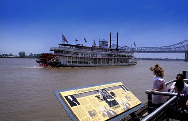 Riverboat on the Mississippi River and sign in wonderful city of New Orleans Louisiana NOLA USA