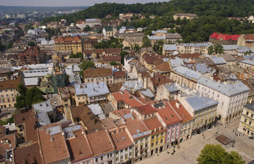 Aerial from above shot from City Hall tower of the beautiful city of Lviv Ukraine looking straight down at the old buildings of city center