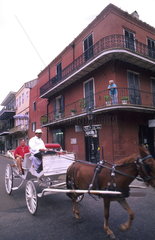 Famous horse carriage ride thru the French Quarter in wonderful city of New Orleans Louisiana NOLA USA