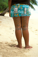 Samoa  girl with tattoos on her legs