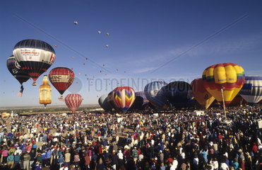 Colorful abstract of hot air balloons in the air in Albuquerque New Mexico at the largest balloon festival in the world called Paint the Sky