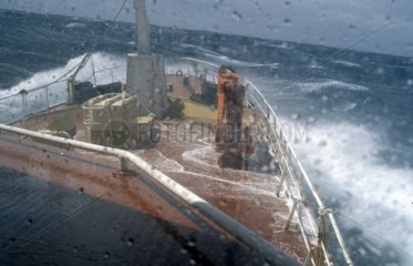 Fish boat at sea under the storm Atlantic