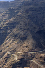Gran Canaria  a road winds through the rugged volcanic mountain slopes