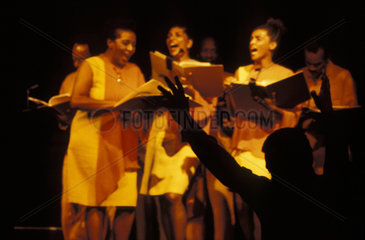 Black singers and conductor during theatre play rehersal. Conducting  reading  show  artists  art.