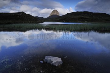 Loch and Mount Suilven at twilight Scotland