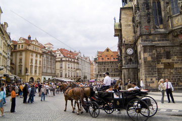 Beautiful colorful architecture and horse drawn carriage in the famous Old Town in Prague Czech Republic