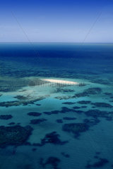 Aerial scene of Great Barrier Reef near Cairns Queensland Australia