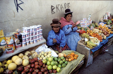 Peru  Women selling fruits and other products on the street.
