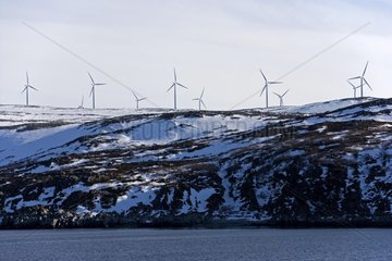 Windmills on a snow-covered mountain North Norway