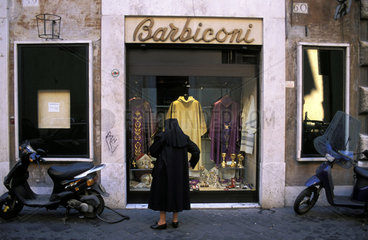 Rome  a nun window shopping at Barbiconi