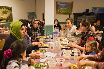 Iftar. Women using the iftar meal.