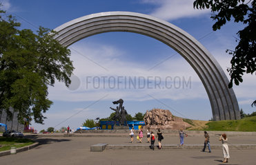 Rainbow Arch in park of city life in Center City with people relaxing downtown in exciting Kiev Ukraine