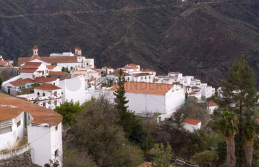 Remote cliffs of Gran Canaria in town of Tejeda with white houses on peaks in Canary Islands Spain