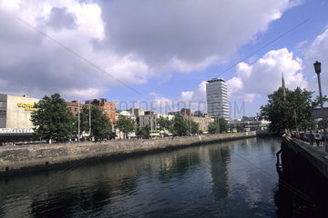 Life in Ireland old Uffet River and skyline in Dublin Ireland