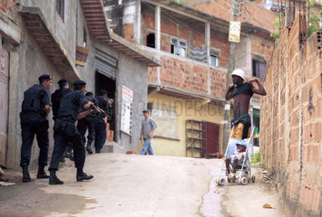 Daily life  violence at Engenho da Rainha slum  Rio de Janeiro  Brazil. Poverty and drug traffic. Police action.