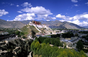 Wonderful Potala Palace on mountain range from another mountain the home of the Dalai Lama in capital city of Lhasa Tibet China