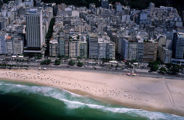 Rio Othon Palace Hotel at Copacabana beach  Atlantic avenue ( Avenida Atlantica )  Rio de Janeiro  Brazil. buildings and beach  urban landscape and tropical beach  contrast  reinforced concrete and nature.