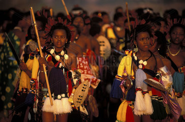 Young women of Swaziland during the Umhlanga. The King__s oldest daughter (left) walking in front of the procession.