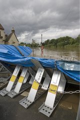 Temporary flood barriers along the flooded River Severn UK