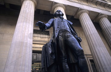 The beauty of the front of the Federal Hall and statue of George Washington where he was swore in in 1789 on Wall Street in New York City USA