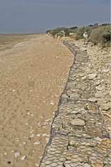 Rockfill preventing sea erosion on the coast Ile de Ré
