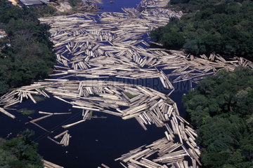 Logging  rain forest clearance  deforestation  Amazon rainforest  Brazil. Transport of truncks in the rivers.